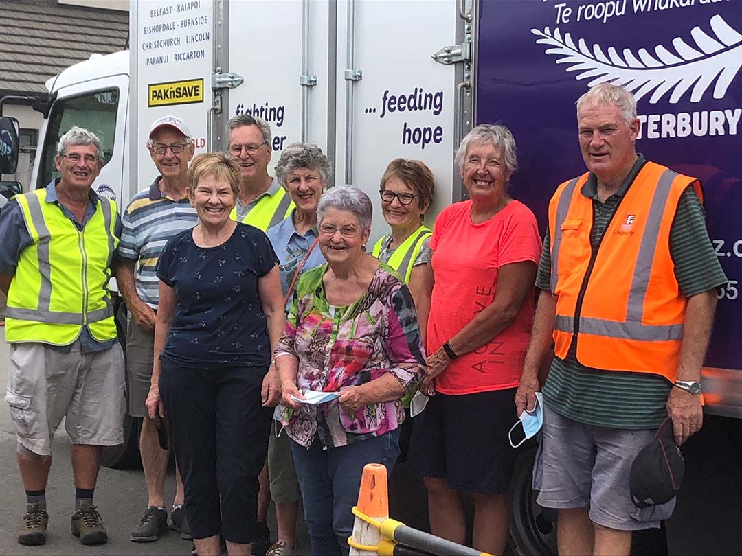 Rotary Foodbank Team members  pictured alongside  one of the Trucks Rotary contributed to