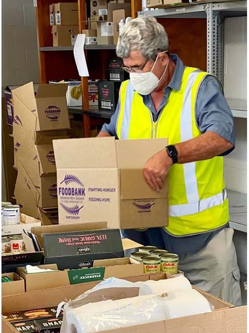 Packing Foodbank items into boxes