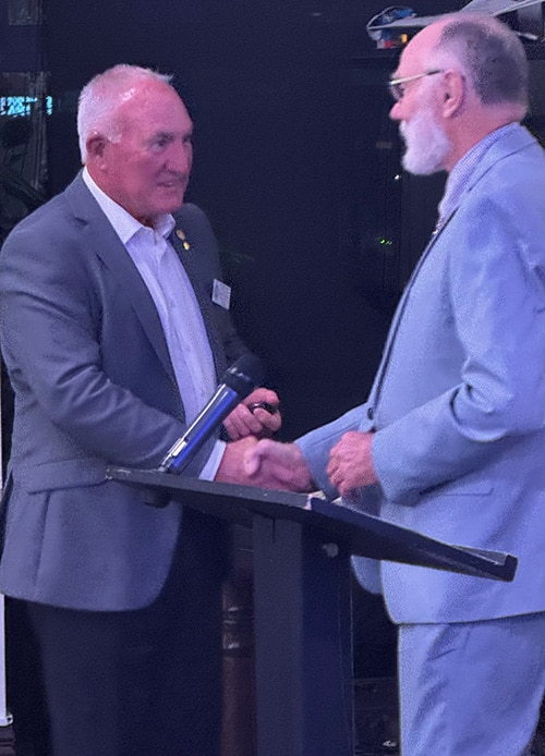 2022/24 President Rod Finch presents Garry Hampton with his Paul Harris Fellow Sapphire Pin